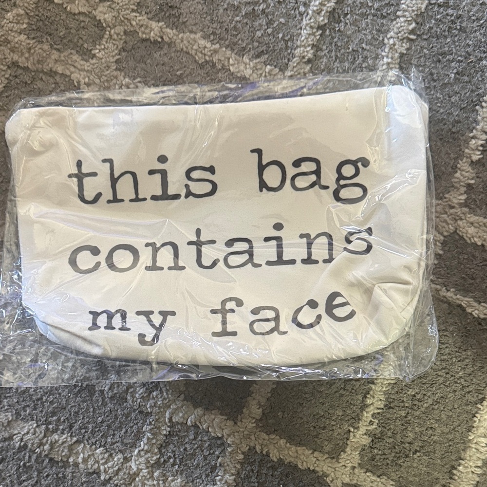 Source Unknown Cream Pouch with Black TextCosmetic Bag